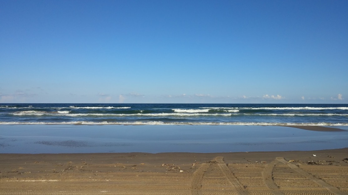 Sea waves and the blue sky