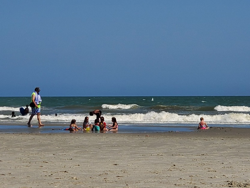 People relaxing on Ocean Park Beach