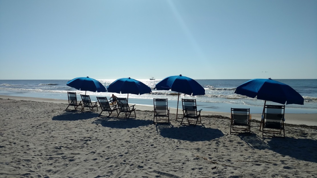 Sunbeds and umbrellas on Singleton Beach SC