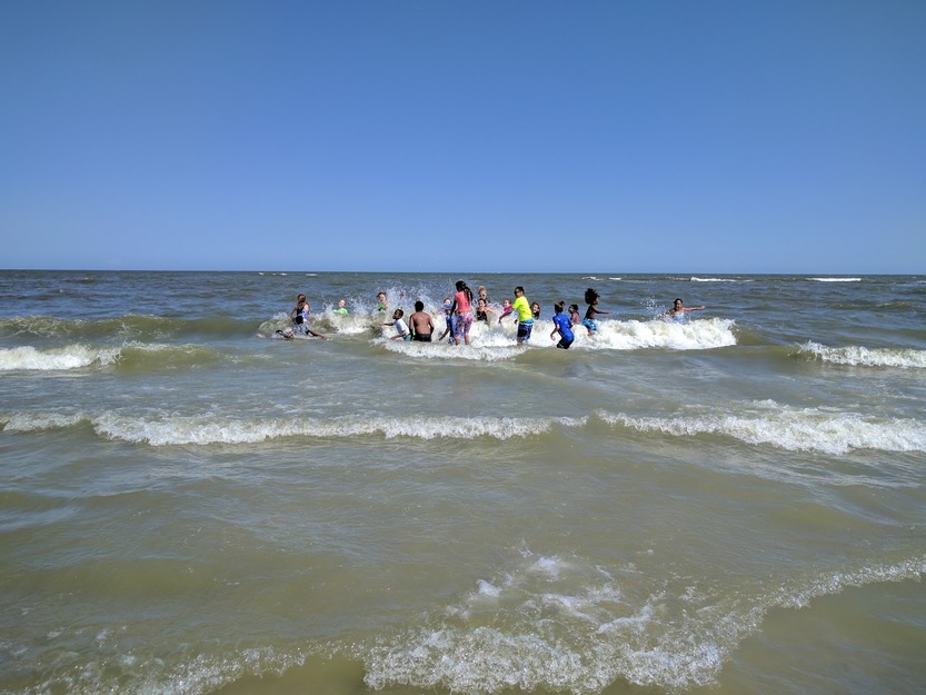 People in the sea waves