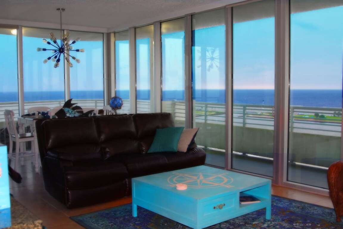 Floor To Ceiling Windows Overlook The Gulf Of Mexico's Pristine White Beaches photo