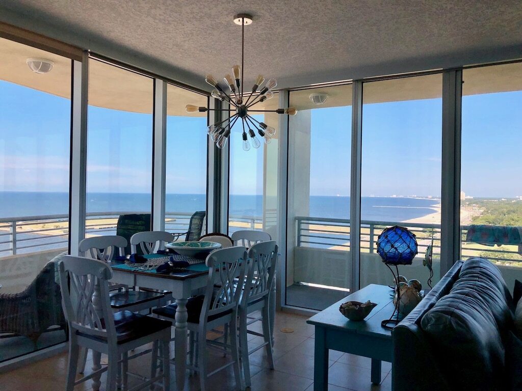 Floor To Ceiling Windows Overlook The Gulf Of Mexico's Pristine White Beaches photo