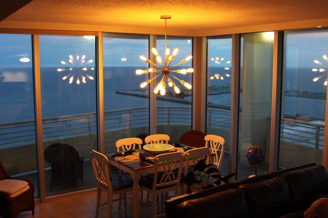 Floor To Ceiling Windows Overlook The Gulf Of Mexico's Pristine White Beaches photo