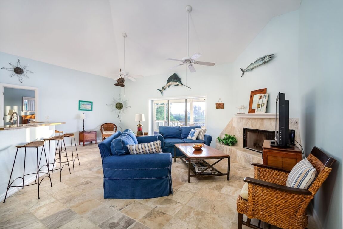 Waterfront Steps to Beach, Hot Tub, Huge Deck, Pets, Tiki Bar,Kayaks Bikes, Dock photo
