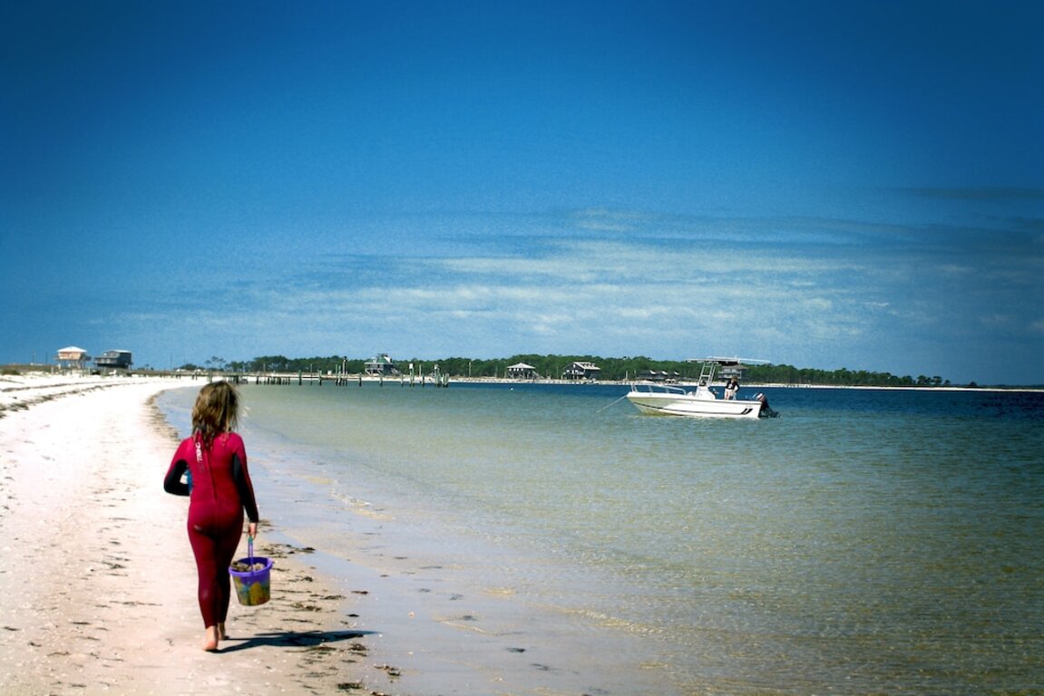 Luxury WATERFRONT condo overlooking pool, 5 mins to Dog Island, FREE boat slip. photo