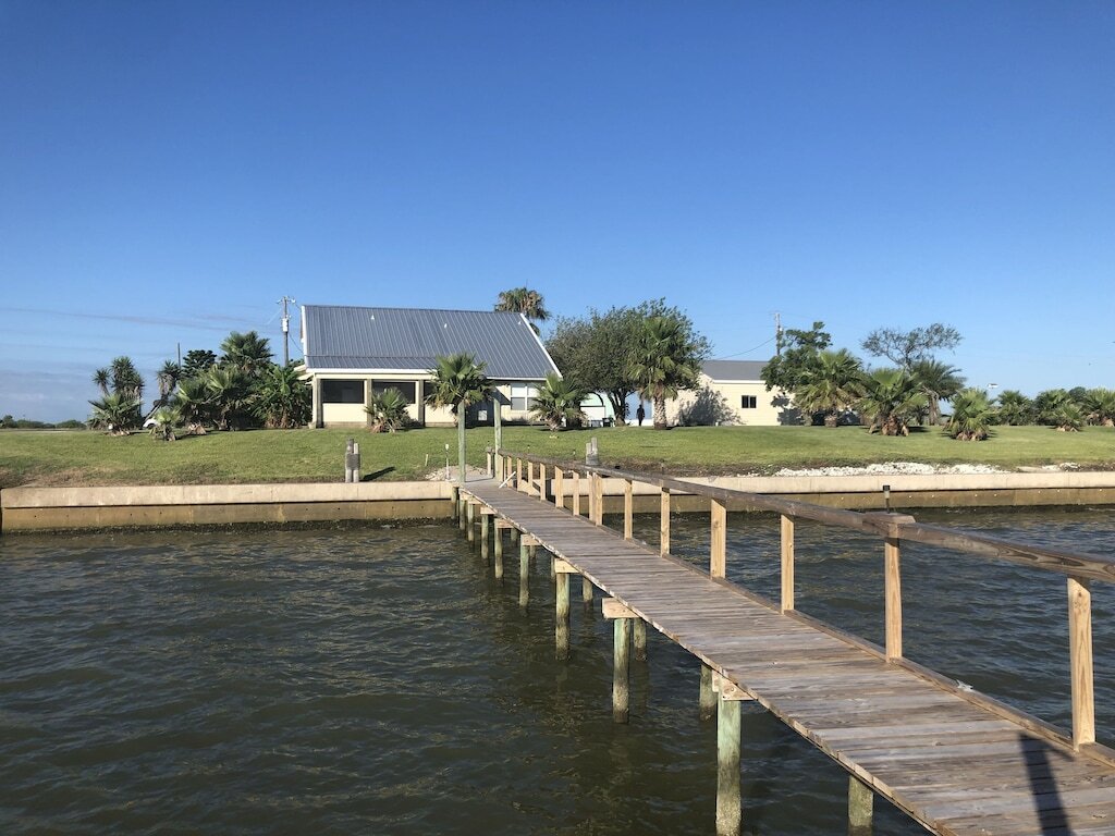 Waterfront Getaway! Relax in this waterfront home with NEW pier on huge lot! photo