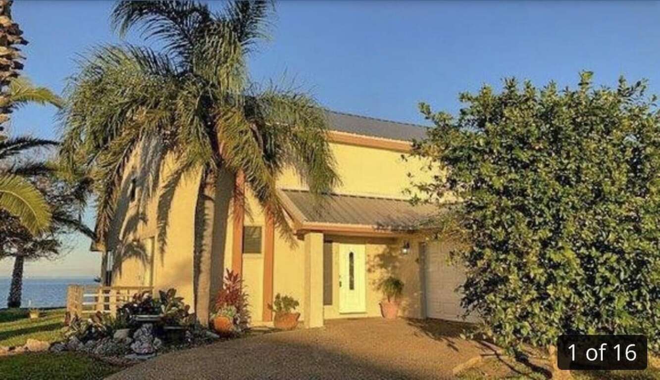 Waterfront Getaway! Relax in this waterfront home with NEW pier on huge lot! photo