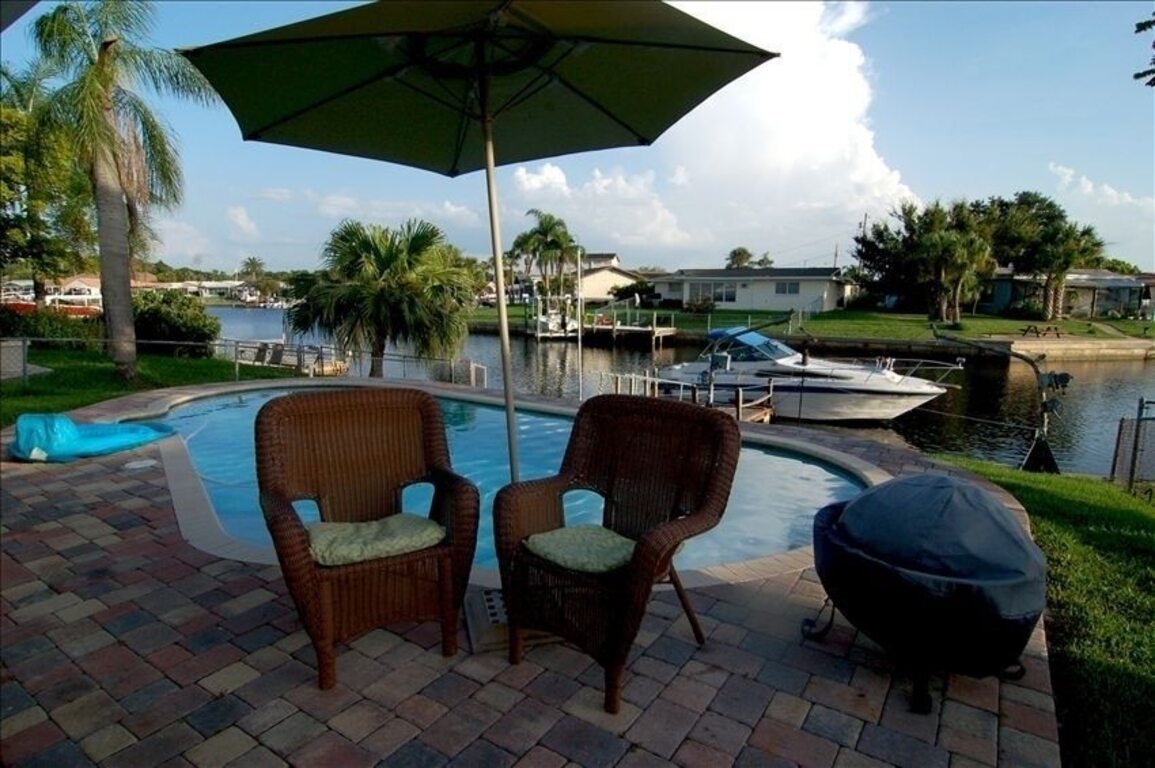 Quaint Waterfront Home with Heated Pool • Just 5 Minutes From the Beach photo