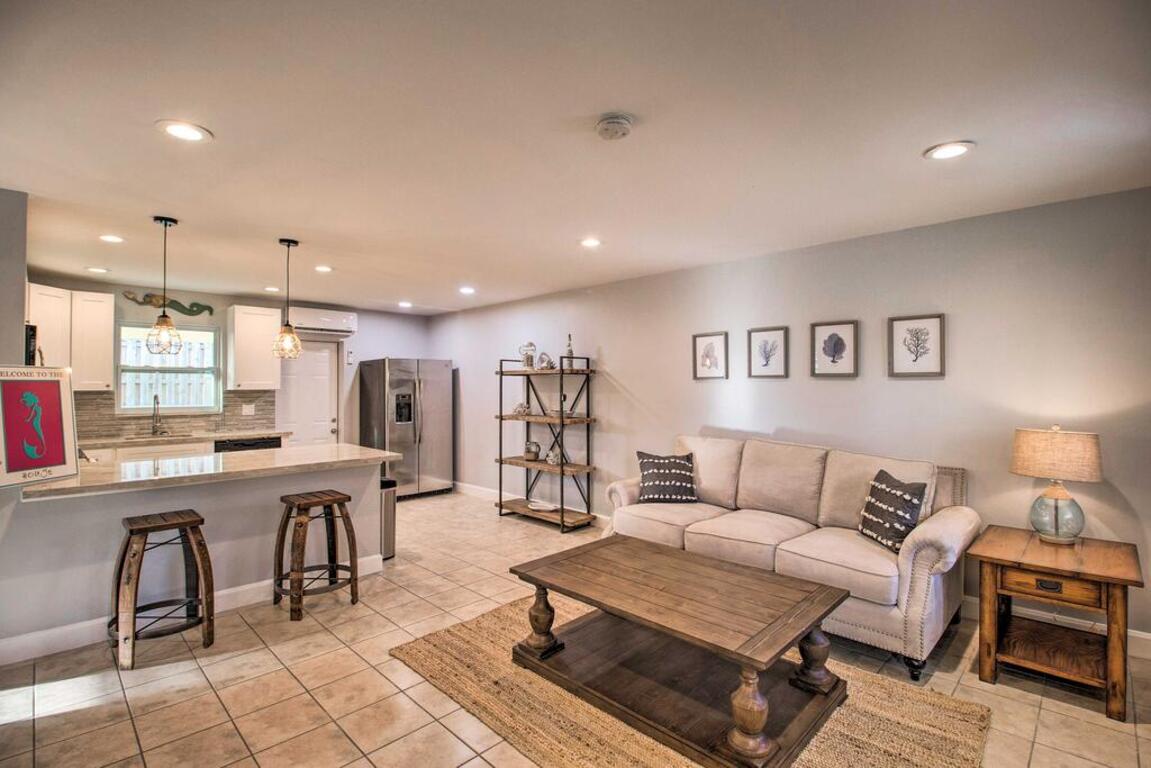Coastal Townhome with Patio, about 2 Mi to Beach! photo