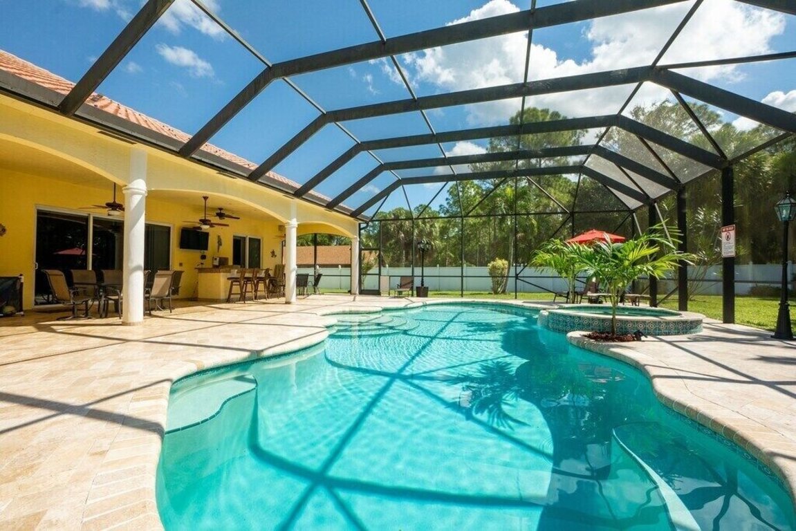 Mediterranean-inspired 4,000 square ft estate home, sleep 15 and Fido too! photo