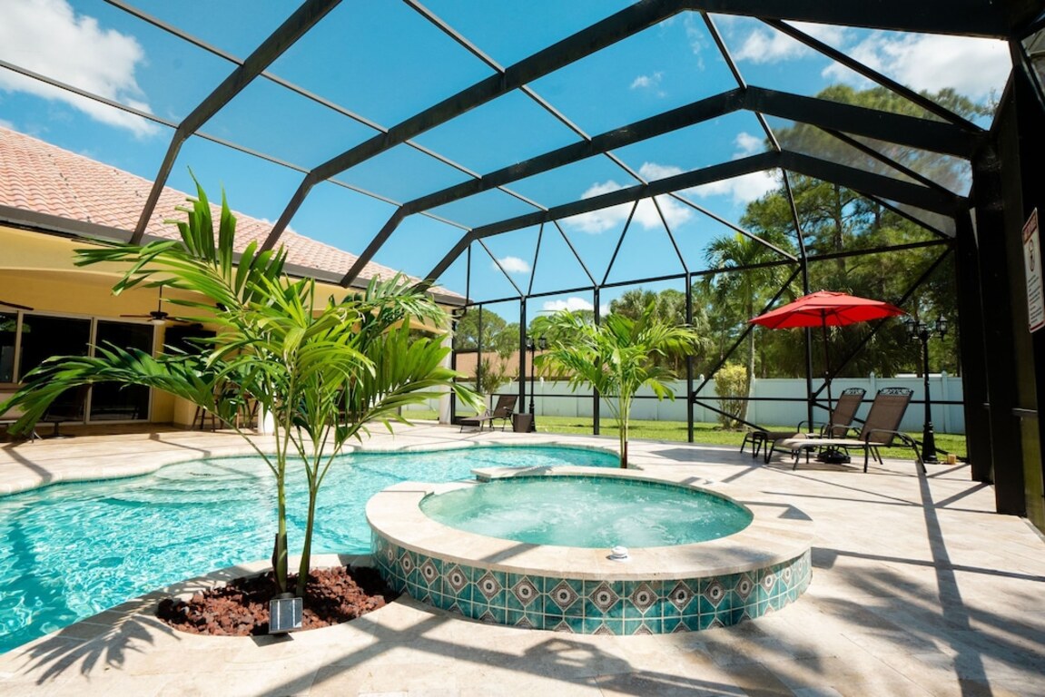 Mediterranean-inspired 4,000 square ft estate home, sleep 15 and Fido too! photo