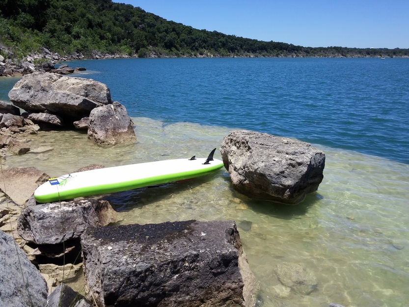 Paddleboard and rocks