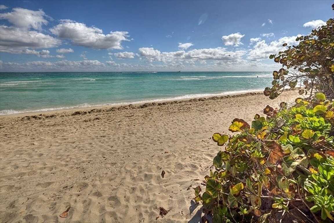Two Story Beach House with Endless Ocean Views and HUGE Terrace! photo