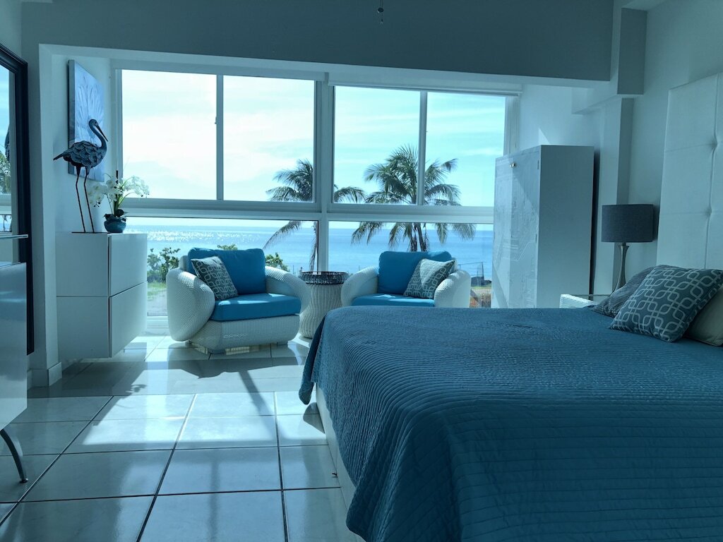 Two Story Beach House with Endless Ocean Views and HUGE Terrace! photo