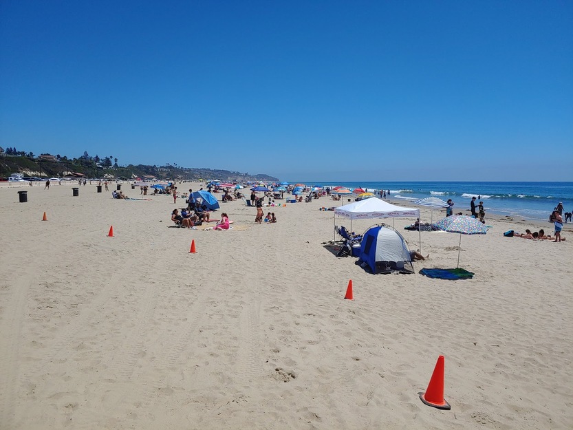 People sunbathing on Zuma Beach CA