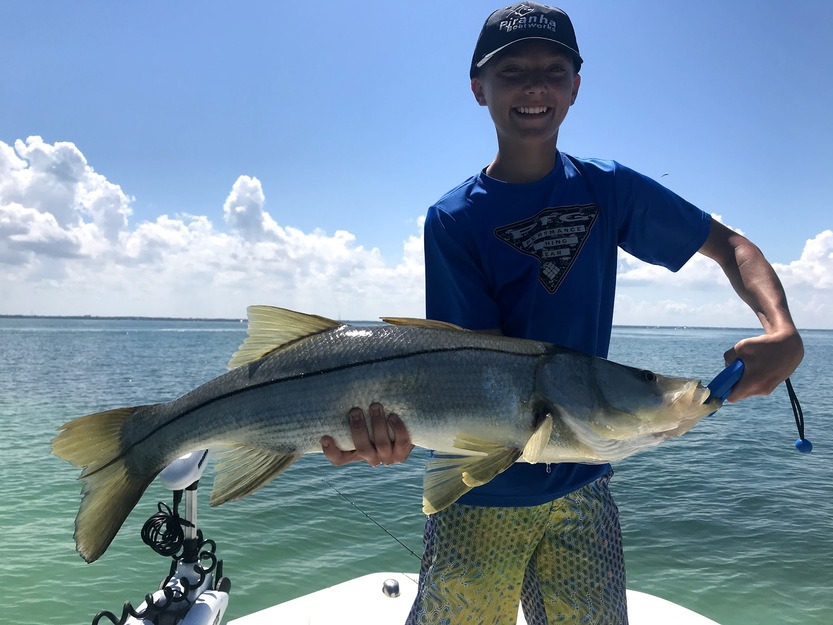 Fisherman with a large fish