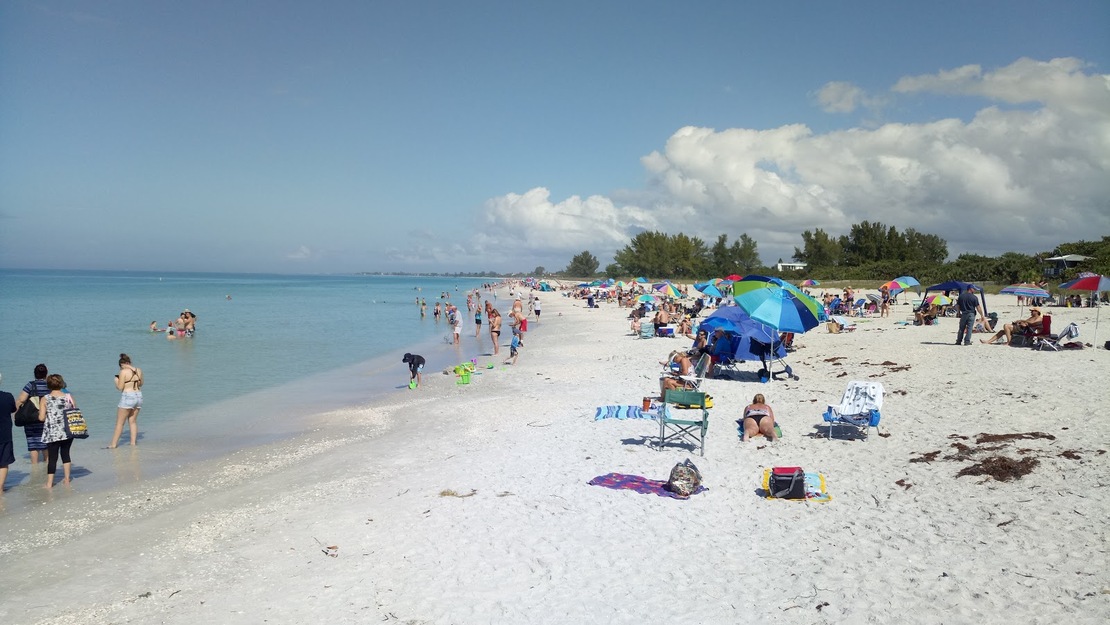 People sunbathing on North Jetty Beach