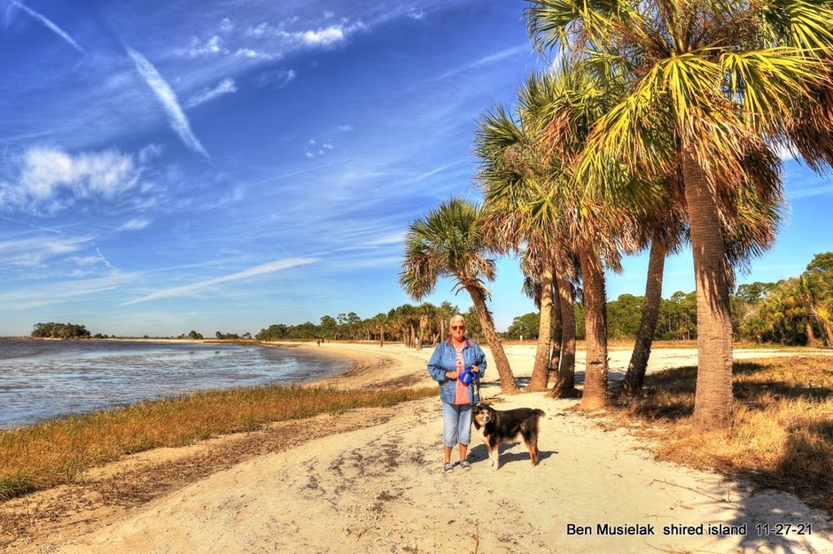 Man and dog on Shired Island Campground Beach