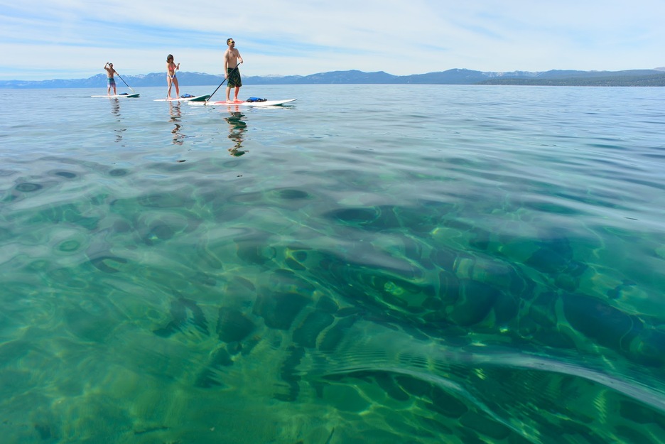 People on sup boards near Kings Beach CA