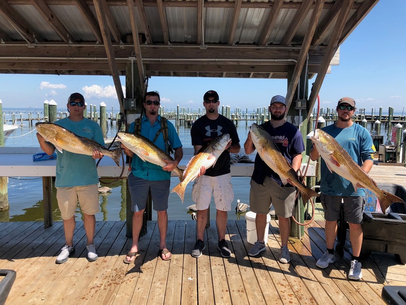 Fishermen with their haul