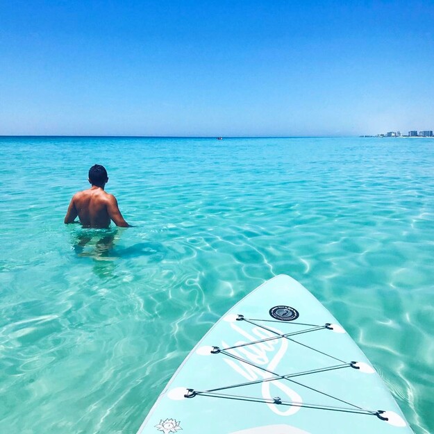 Paddleboarding and bathing