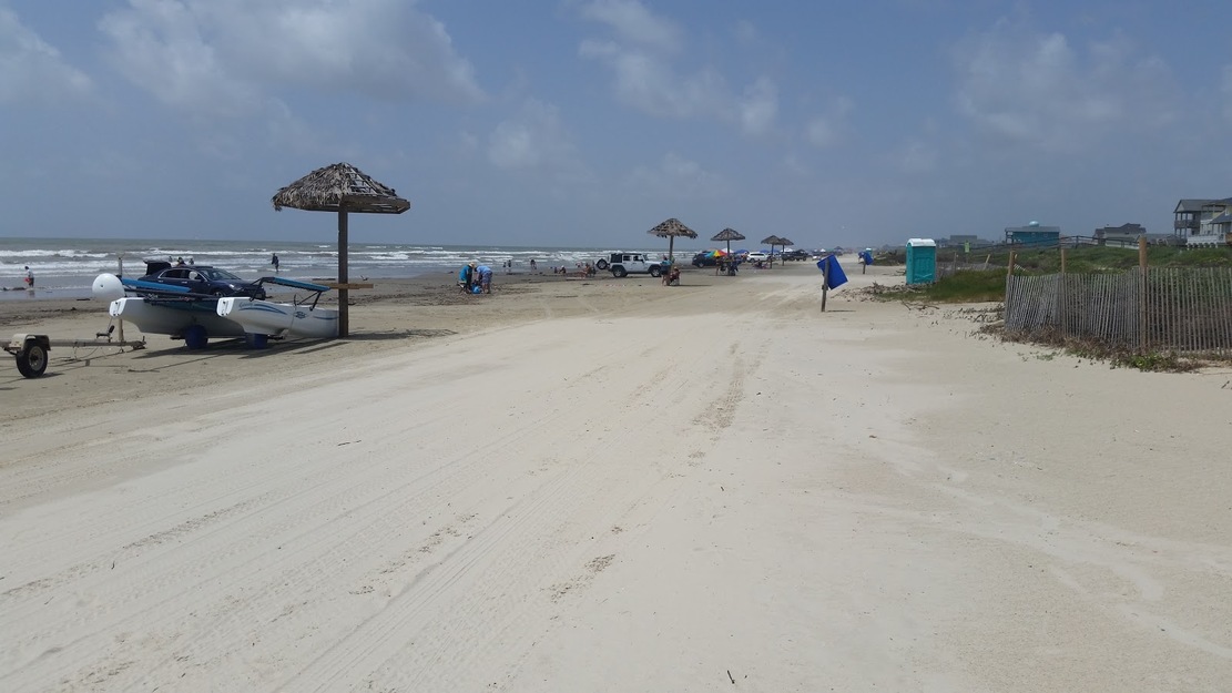 Thatched umbrellas on Surfside Beach