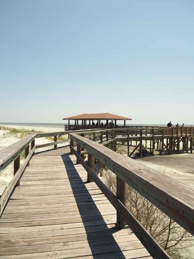 Wooden boardwalk and pavilion on Nanny Goat Beach