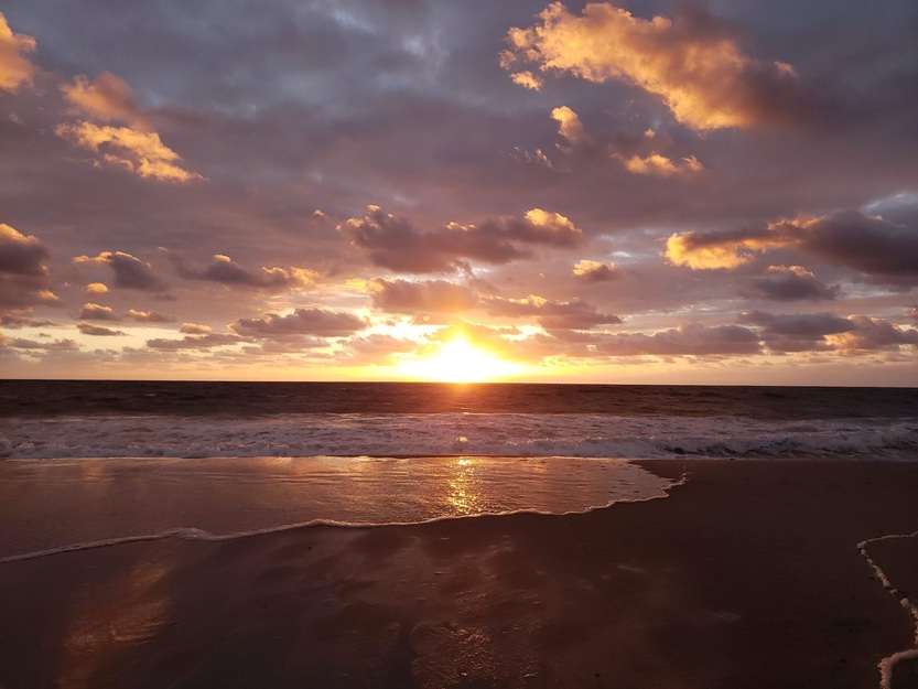 Sun rising over the sea